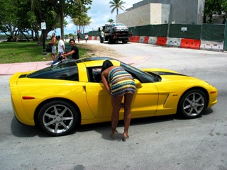 Sweetie Admires Yellow Corvette - © 2009 Jimmy Rocker Photography