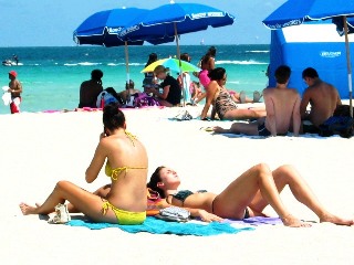 Two Beautiful Beach Girls Getting 
Tanned on the Beach #2 - © 2012 Jimmy Rocker Photography